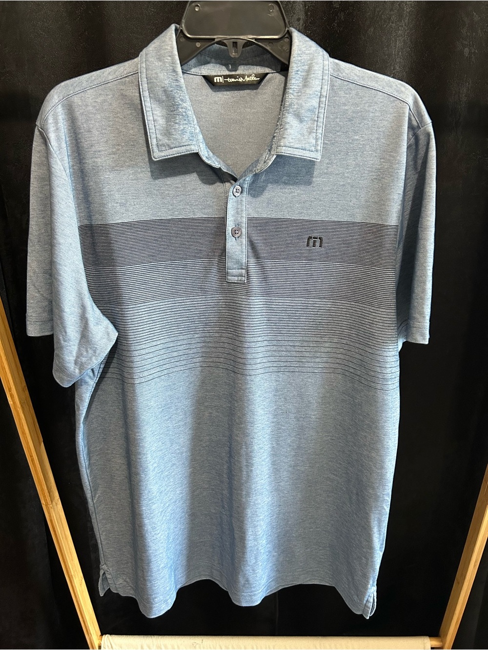 Travis Mathew Heathered Blue Polo with Subtle Stripe